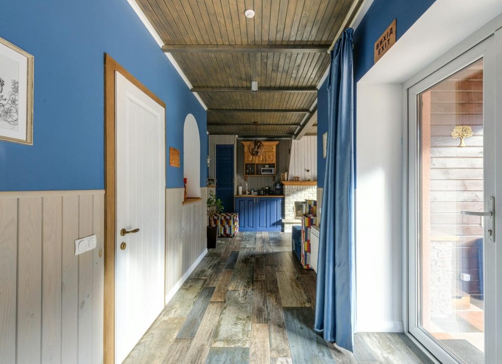 house hallway with brown wooden floor